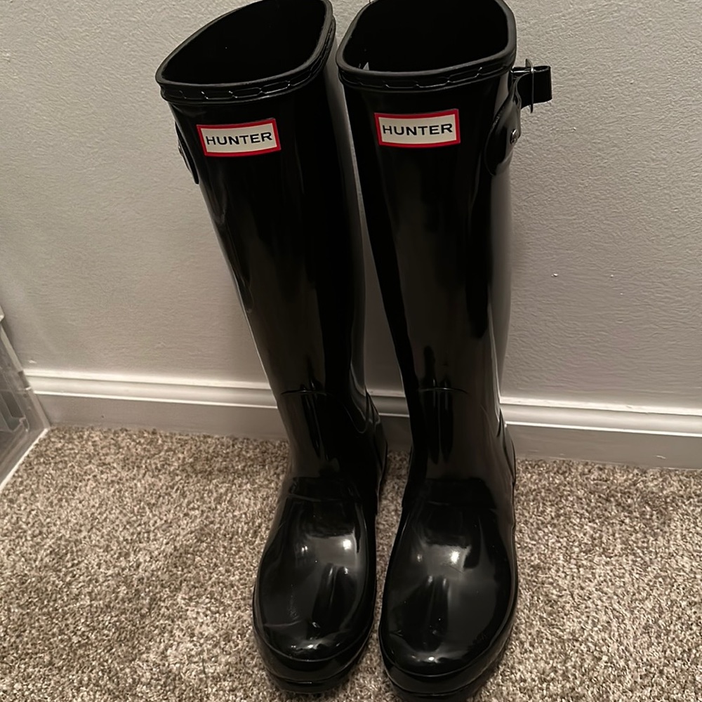 Tall black Hunter rain boots and socks